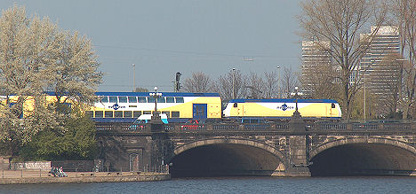 Metronom crossing the Hamburg Alster Lake in Spring